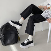Zapatillas de lona con plataforma gruesa y costuras blancas y negras